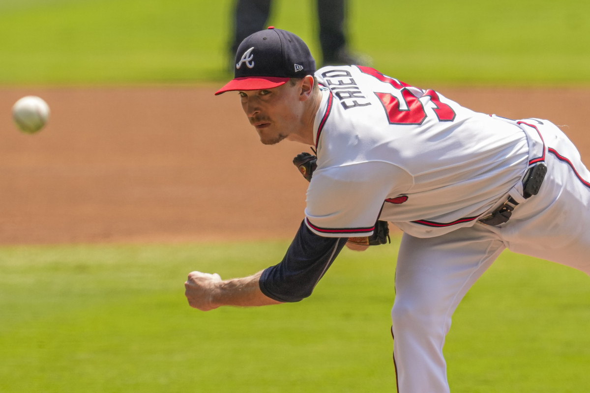 Aug 20, 2023; Cumberland, Georgia, USA; Atlanta Braves starting pitcher Max Fried (54) pitches against the San Francisco Giants during the first inning at Truist Park.